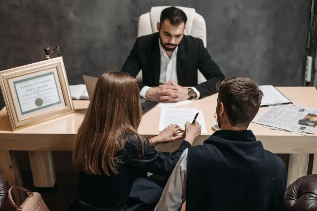Lawyer meeting with clients in a law office