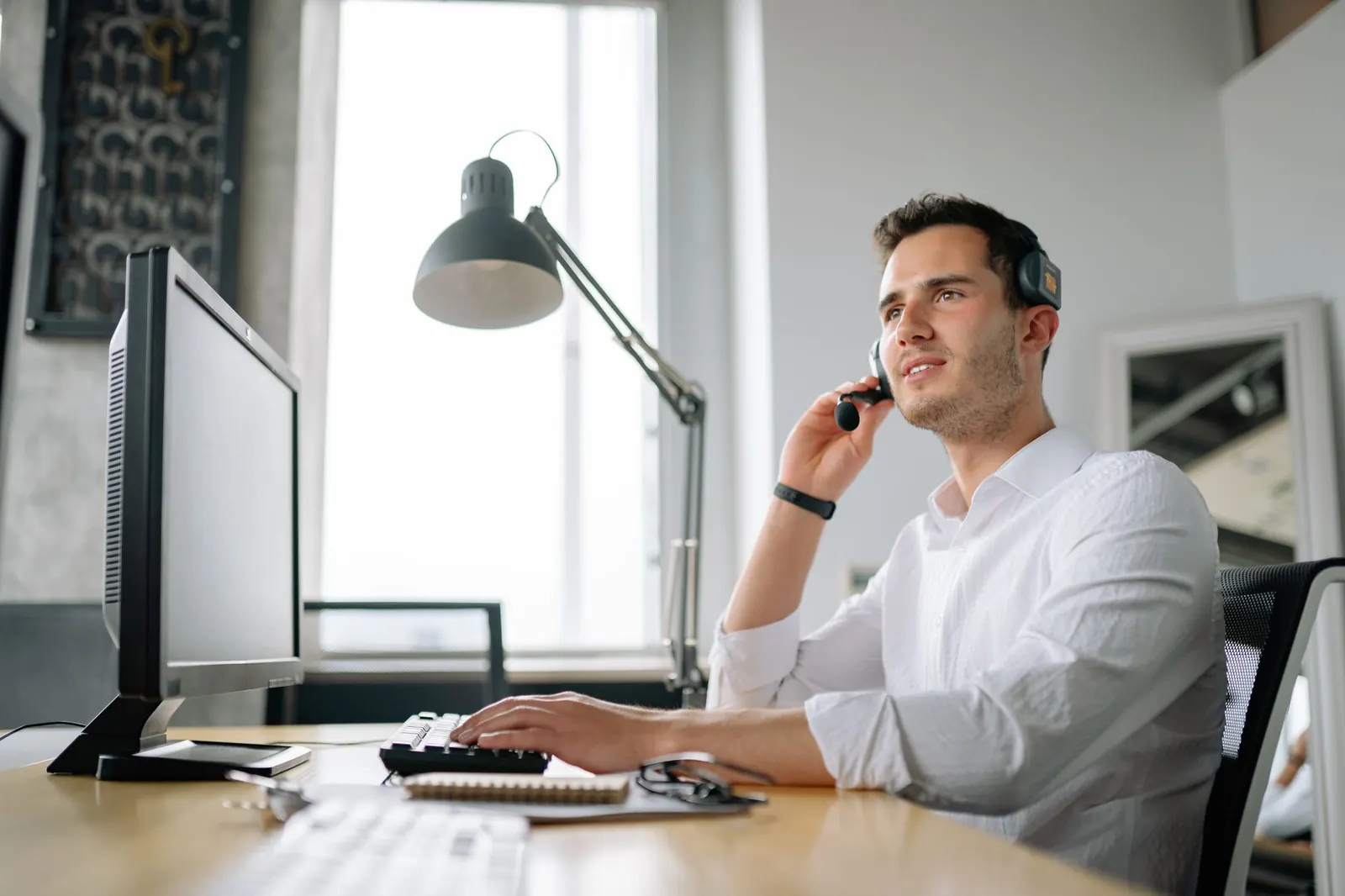 Employee on a clear VoIP business call
