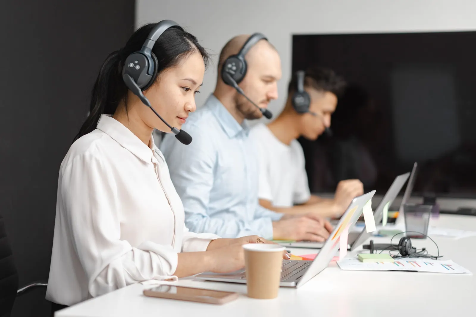 Small business team on VoIP phone calls