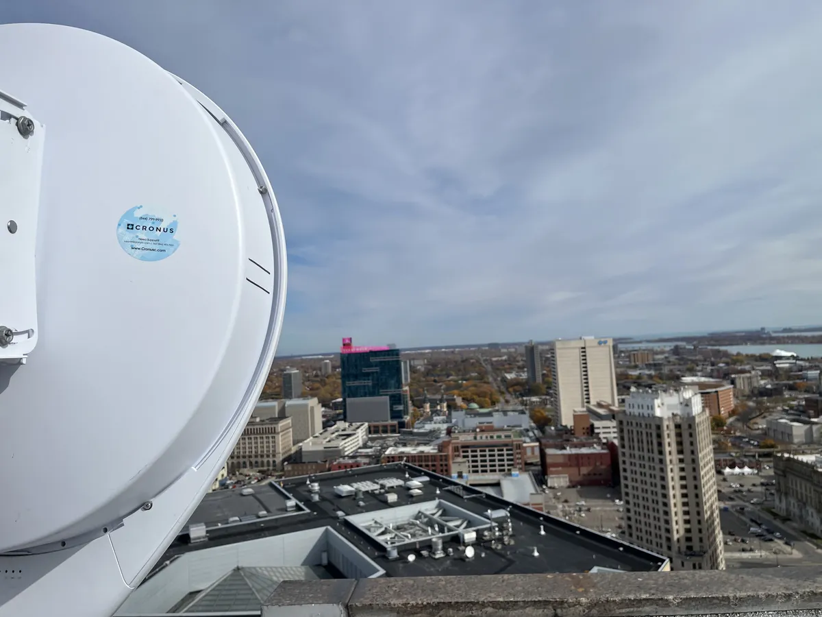 Cronus technicians maintaining rooftop wireless equipment in Detroit