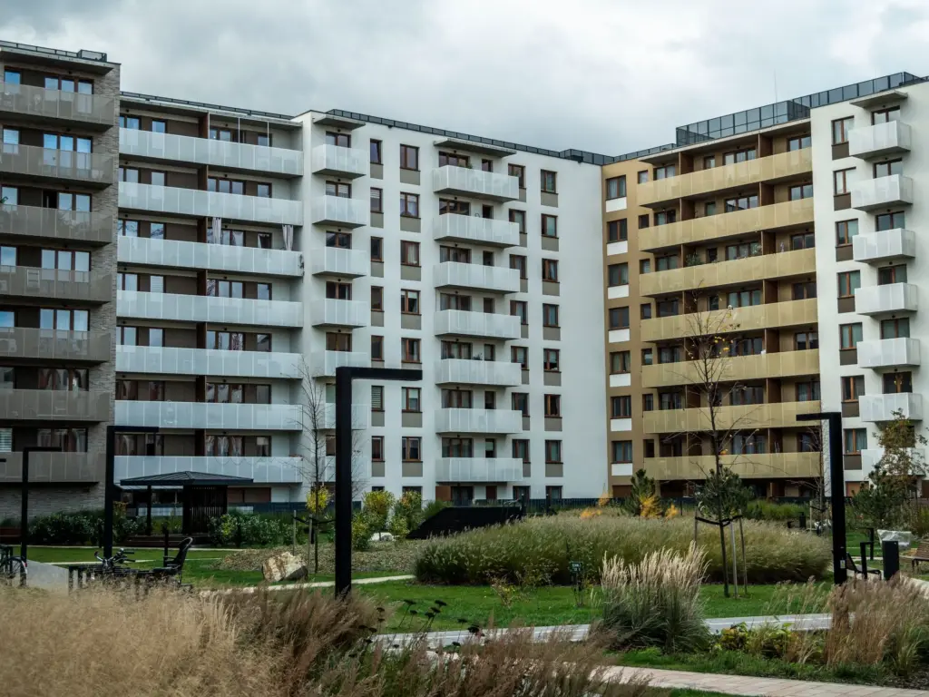 Modern apartment complex with landscaped grounds