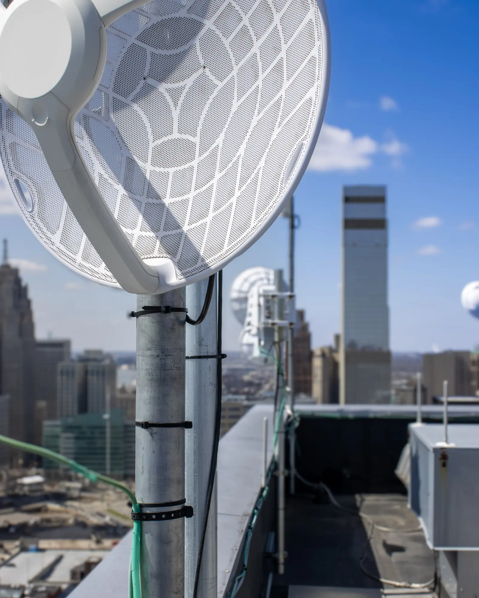Cronus rooftop dish overlooking downtown Detroit
