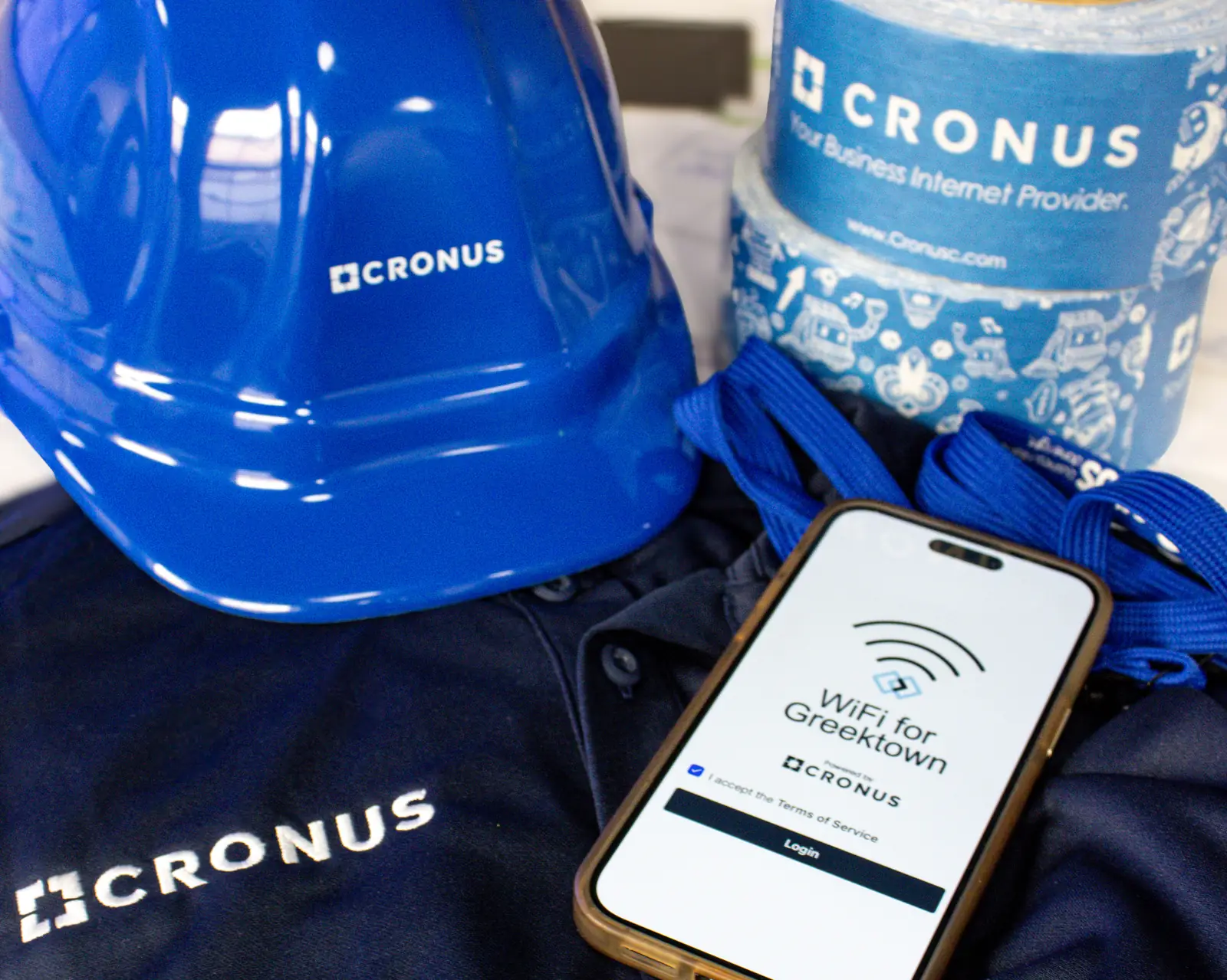 5G business internet from Cronus: team member connecting a phone to the network