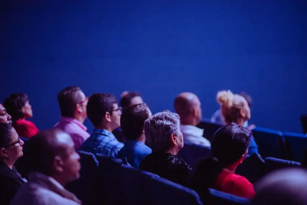 Conference audience connected to event Wi-Fi
