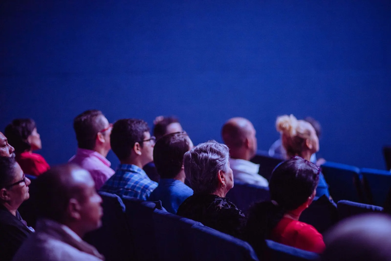 Conference audience connected to event Wi-Fi